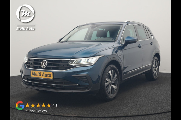 Volkswagen Tiguan 1.4 TSI eHybrid Elegance PHEV 245pk Dealer O.H. | SOH 88,4% | Trekhaak Af Fabriek | Adaptive Cruise | Camera | Alcantara Sportstoelen Massage & Verwarmd | Stuur Verwarmd | Apple Carplay | Navigatie | DAB | Plug In Hybrid |