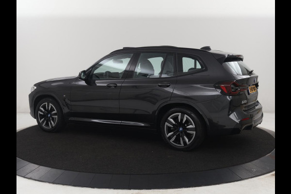BMW iX3 M Sport Executive 80 kWh | SOH 93,8% | Panoramadak | Leder | Stoelverwarming | Adaptive cruise | Carplay | Sfeerverlichting | Camera | Park assist | Elektrische achterklep | PHEV
