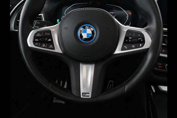 BMW iX3 M Sport Executive 80 kWh | SOH 93,8% | Panoramadak | Leder | Stoelverwarming | Adaptive cruise | Carplay | Sfeerverlichting | Camera | Park assist | Elektrische achterklep | PHEV