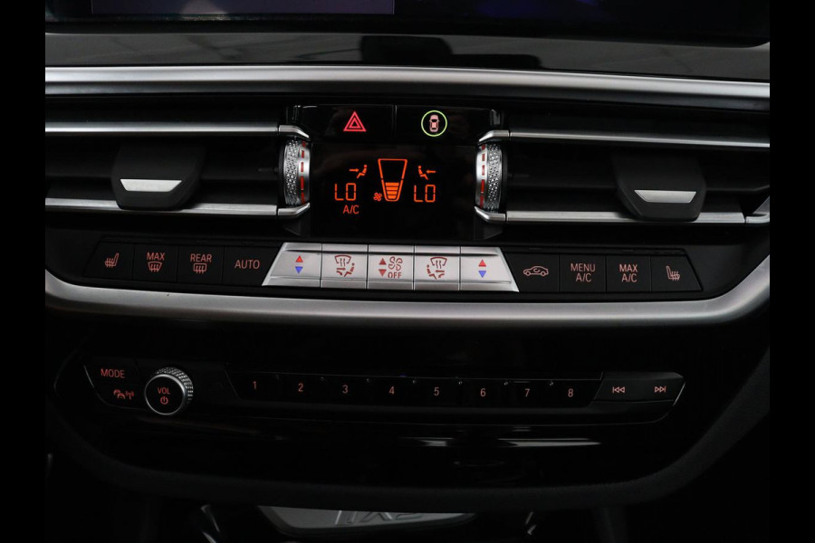 BMW iX3 M Sport Executive 80 kWh | SOH 93,8% | Panoramadak | Leder | Stoelverwarming | Adaptive cruise | Carplay | Sfeerverlichting | Camera | Park assist | Elektrische achterklep | PHEV