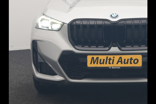 BMW X1 xDrive30e M Sport PHEV 326pk Dealer O.H. | SOH 95,9% | Trekhaak Af Fabriek | Panodak | Head Up | Adaptive Cruise | 360 Camera | Harman / Kardon | Alcantara Sportstoelen Massage & Memory | BLIS | Keyless | Stuur Verwarmd | Navigatie  Plug In Hybrid |