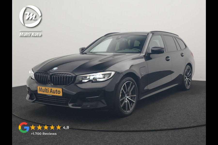 BMW 3 Serie Touring 330e xDrive Sportline PHEV 293pk Dealer O.H | SOH 87,9% | Trekhaak Af Fabriek | Camera | Lederen Sportstoelen Verwarmd | Apple Carplay | Sfeerverlichting | Navigatie | Virtual | Cruise Control | DAB | 18"L.M | Plug In Hybrid |