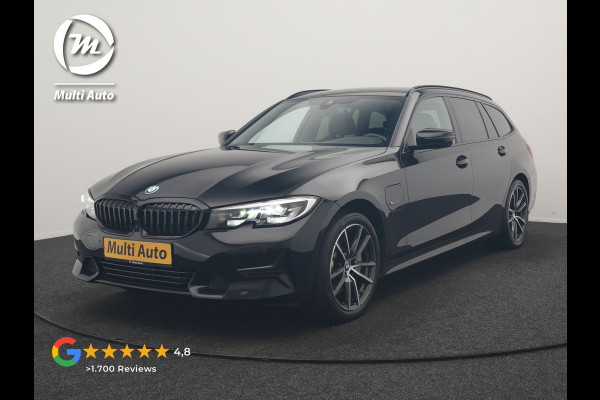 BMW 3 Serie Touring 330e xDrive Sportline PHEV 293pk Dealer O.H | SOH 87,9% | Trekhaak Af Fabriek | Camera | Lederen Sportstoelen Verwarmd | Apple Carplay | Sfeerverlichting | Navigatie | Virtual | Cruise Control | DAB | 18"L.M | Plug In Hybrid |