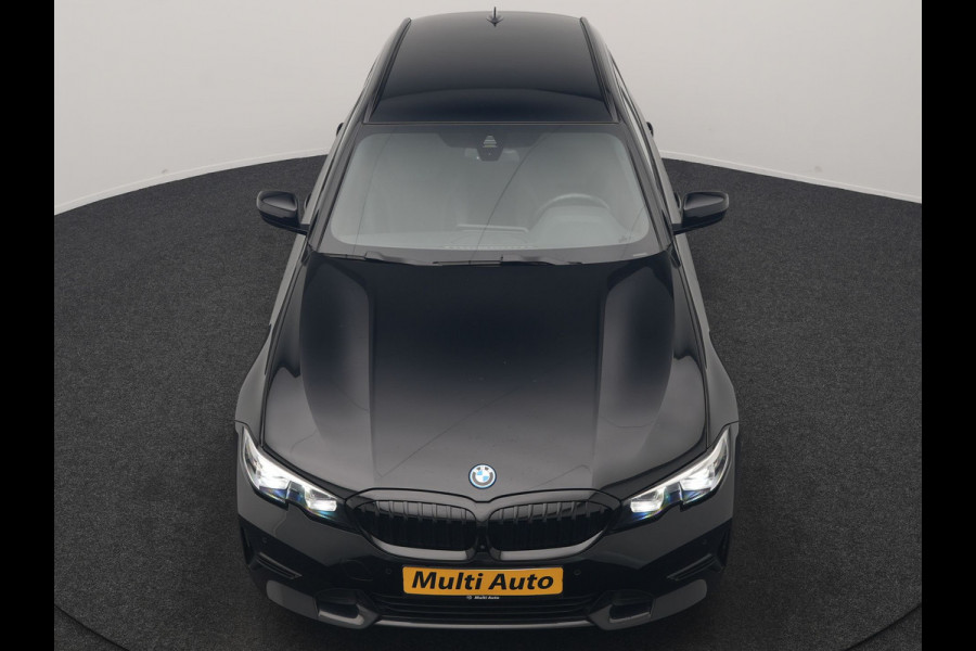 BMW 3 Serie Touring 330e xDrive Sportline PHEV 293pk Dealer O.H | SOH 87,9% | Trekhaak Af Fabriek | Camera | Lederen Sportstoelen Verwarmd | Apple Carplay | Sfeerverlichting | Navigatie | Virtual | Cruise Control | DAB | 18"L.M | Plug In Hybrid |