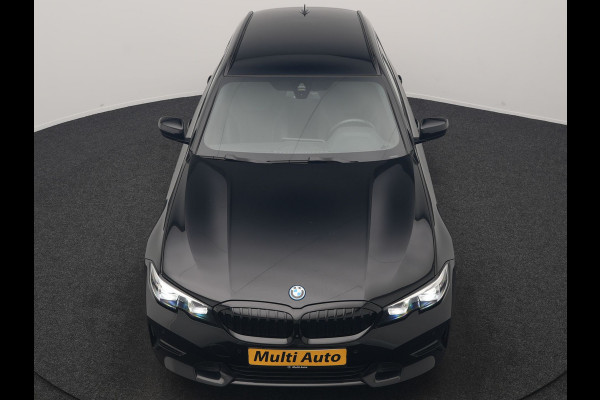 BMW 3 Serie Touring 330e xDrive Sportline PHEV 293pk Dealer O.H | SOH 87,9% | Trekhaak Af Fabriek | Camera | Lederen Sportstoelen Verwarmd | Apple Carplay | Sfeerverlichting | Navigatie | Virtual | Cruise Control | DAB | 18"L.M | Plug In Hybrid |