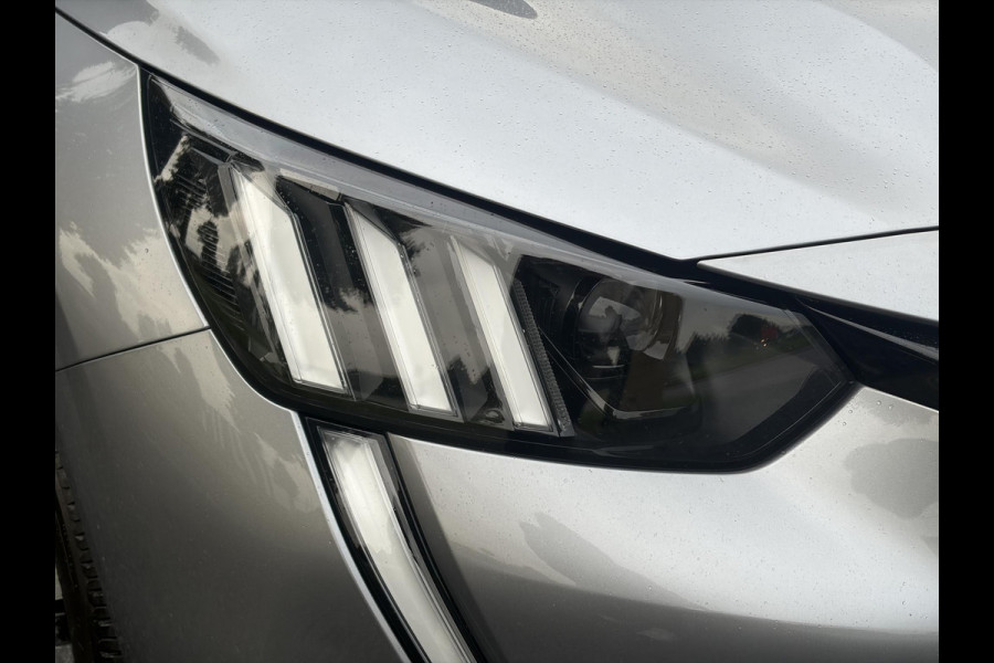 Peugeot 208 1.2 PureTech Allure ✓101pk✓D-riem vv 10-2025✓Dealer Onderhouden✓Carplay✓Draadloze telefoonlader✓360 ° Camera✓Afn Trekhaak✓Navi✓Clima✓Cruise✓Lm velgen✓6 Bak✓Keyless✓Halfleder✓Rijstrooksensor✓Pdc V+A✓N.A.P✓Apk tot 09-2028