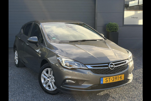 Opel Astra 1.0 Online Edition ✓2e Eigenaar✓Trekhaak✓Carplay✓Dealer Onderhouden✓Navi✓105pk✓Pdc V+A✓Clima✓Cruise✓Lm velgen✓N.A.P✓Apk tot 05-2027