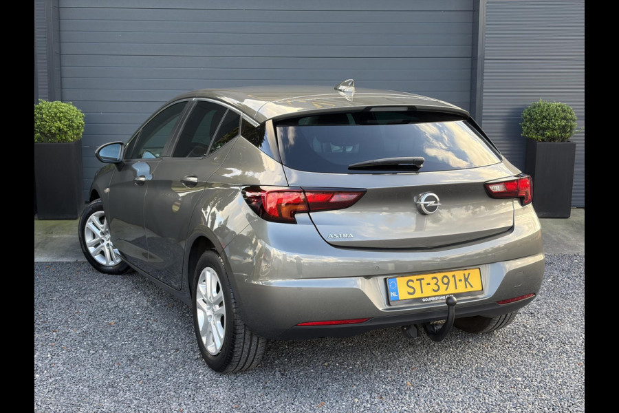 Opel Astra 1.0 Online Edition ✓2e Eigenaar✓Trekhaak✓Carplay✓Dealer Onderhouden✓Navi✓105pk✓Pdc V+A✓Clima✓Cruise✓Lm velgen✓N.A.P✓Apk tot 05-2027