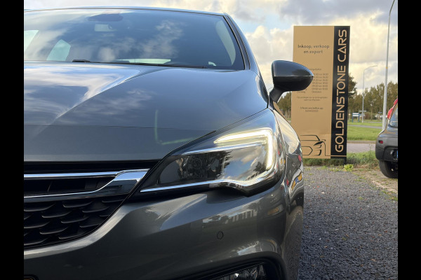 Opel Astra 1.0 Online Edition ✓2e Eigenaar✓Trekhaak✓Carplay✓Dealer Onderhouden✓Navi✓105pk✓Pdc V+A✓Clima✓Cruise✓Lm velgen✓N.A.P✓Apk tot 05-2027