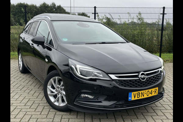 Opel Astra SPORTS TOURER+ | Grijs Kenteken | Carplay | PDC | Trekhaak | 1ste eigenaar |