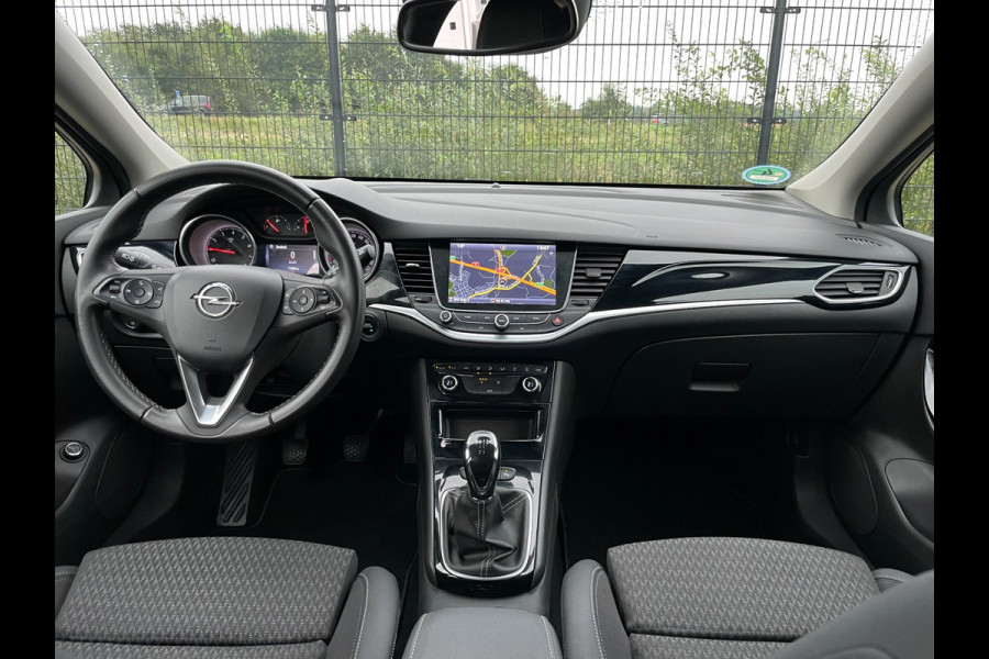 Opel Astra SPORTS TOURER+ | Grijs Kenteken | Carplay | PDC | Trekhaak | 1ste eigenaar |