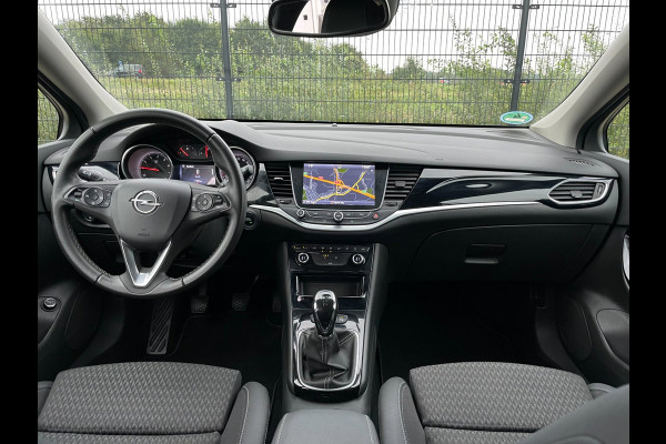 Opel Astra SPORTS TOURER+ | Grijs Kenteken | Carplay | PDC | Trekhaak | 1ste eigenaar |