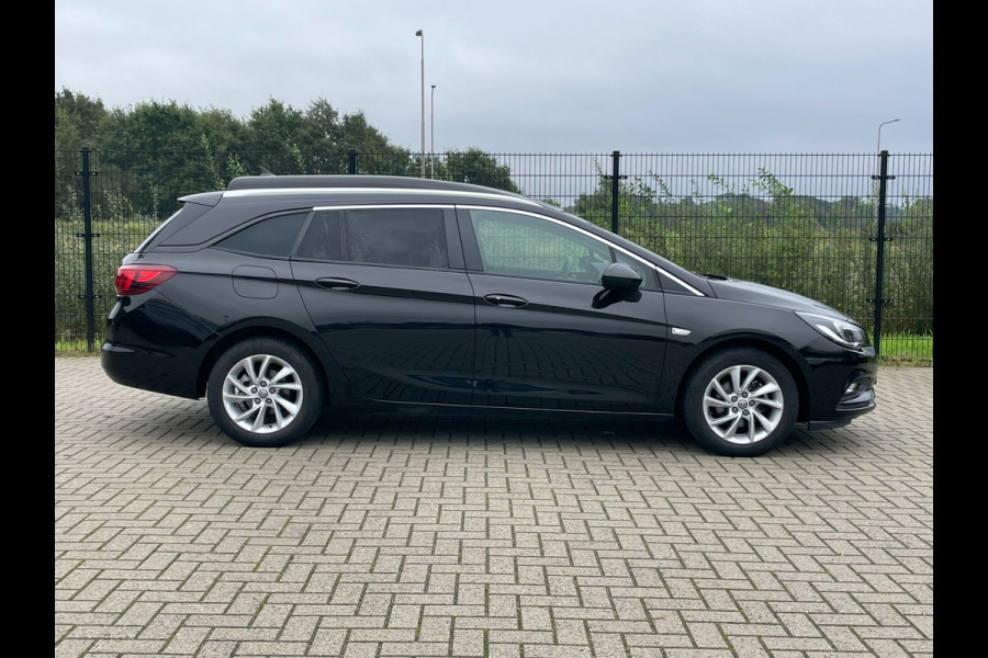 Opel Astra SPORTS TOURER+ | Grijs Kenteken | Carplay | PDC | Trekhaak | 1ste eigenaar |