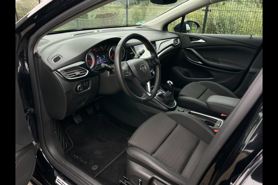 Opel Astra SPORTS TOURER+ | Grijs Kenteken | Carplay | PDC | Trekhaak | 1ste eigenaar |