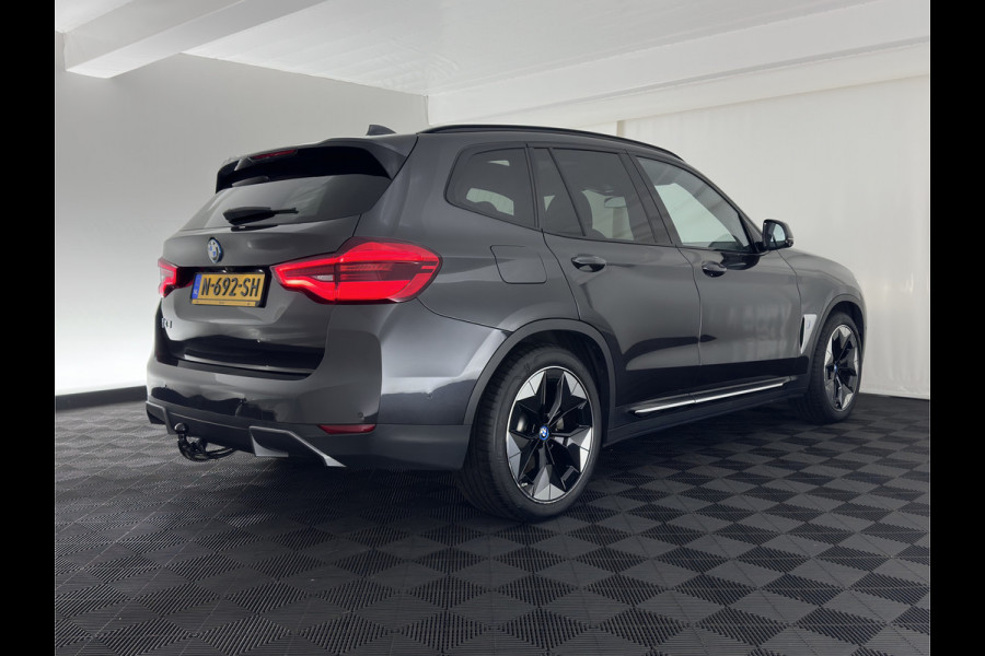 BMW iX3 High Executive 80 kWh [3-Fase-11kW] {SoH-100%} (INCL-BTW) Aut. *PANO | LEATHER | HARMAN/KARDON | ADAPTIVE-CRUISE | FULL-LED | BLINDSPOT | MEMORY-PACK | DIGI-COCKPIT | HEATED-SPORTSEATS | KEYLESS | CAMERA | DAB+ | TOWBAR | HEAD-UP | 20''AL