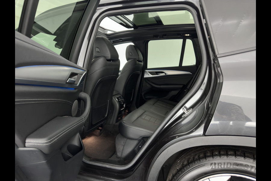 BMW iX3 High Executive 80 kWh [3-Fase-11kW] {SoH-100%} (INCL-BTW) Aut. *PANO | LEATHER | HARMAN/KARDON | ADAPTIVE-CRUISE | FULL-LED | BLINDSPOT | MEMORY-PACK | DIGI-COCKPIT | HEATED-SPORTSEATS | KEYLESS | CAMERA | DAB+ | TOWBAR | HEAD-UP | 20''AL