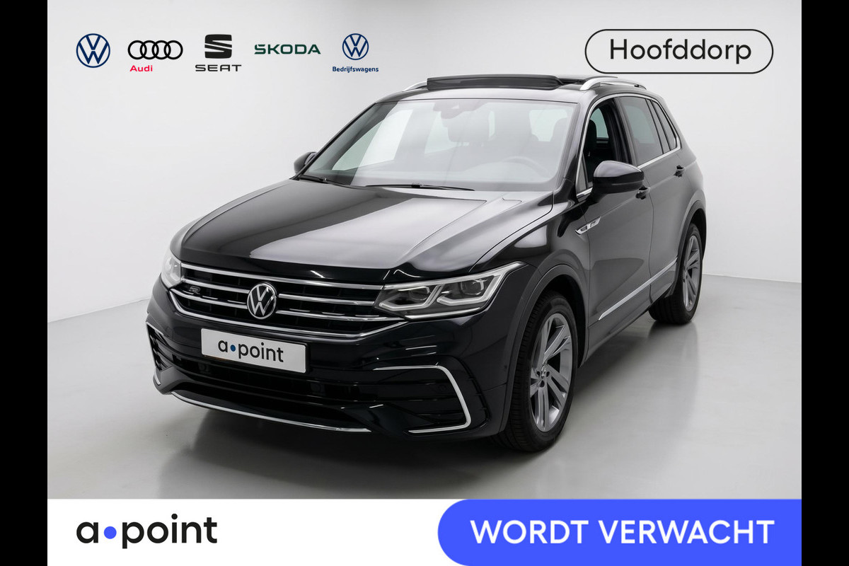 Volkswagen Tiguan 1.4 TSI eHybrid R-Line Business+ 245 pk Automaat (DSG) | Navigatie | Panoramadak | Trekhaak (wegklapbaar) | Achteruitrijcamera | Adaptieve cruise control | Stoelverwarming v/a | Apple carplay / Android auto | Verwarmd stuur | R line |