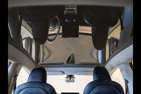 Tesla Model Y RWD 58 kWh SOH 91% / 299pk / Trekhaak /