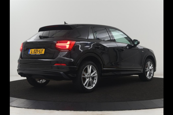 Audi Q2 1.4 TFSI CoD Triple S-Line | Half leder | Stoelverwarming | Trekhaak | Cruise control | Navigatie | Bluetooth | Climate control | Full LED