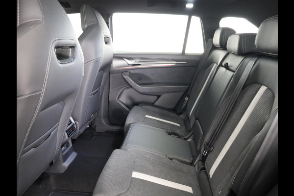 Škoda Kodiaq 1.5 TSI PHEV Sportline Business 204 pk 6 versn. DSG | Comfort Pakket | Panorama Dak | Dynamic Chassis Control Pakket | Head-up display | Parkeer Pakket | Trekhaak | Winter Pakket | Velgen: 20" lichtmetalen velgen Rila aero, antraciet zwart