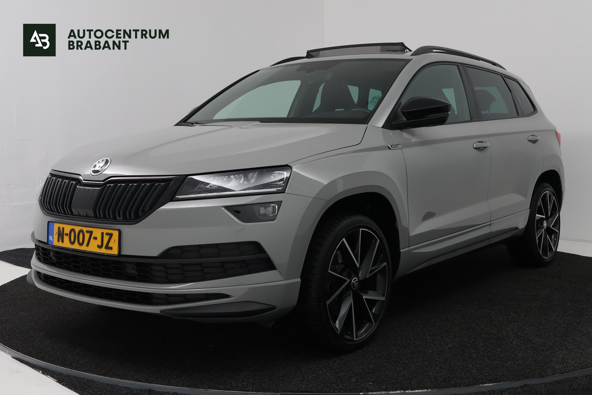 Škoda Karoq 1.5 TSI ACT Sportline Business (PANORAMADAK, TREKHAAK, STOEL/STUUR VERWARMING, CAMERA)