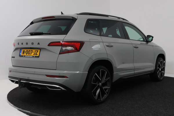 Škoda Karoq 1.5 TSI ACT Sportline Business (PANORAMADAK, TREKHAAK, STOEL/STUUR VERWARMING, CAMERA)