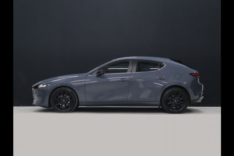 Mazda 3 2.0 e-SkyActiv-G M Hybrid 122 Comfort met Bose [APAPTIVE CRUISE CONTROL, APPLE CARPLAY, ANDROID, BOSE SOUND SYSTEM, MEMORY SEATS, STOELVERWARMING STUUR VERWARMING, CAMERA, PDC V+A, BLUETOOTH, LEDER, LED, ELEKTRISCHE ACHTERKLEP, NAVIGATIE,