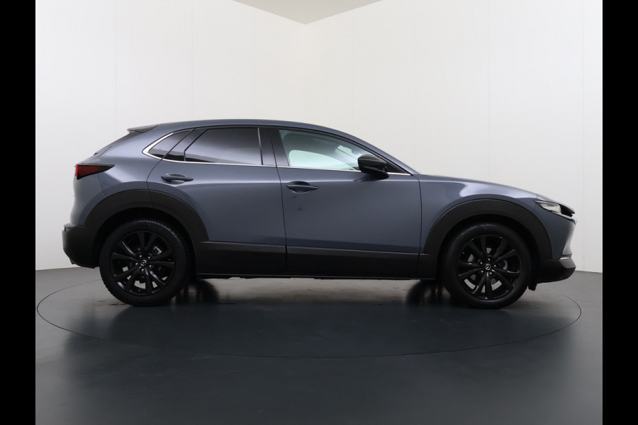 Mazda CX-30 2.0I 187PK M.Hybrid Automaat Trekhaak Adap.Cruise Camera Stoelverwarming Ecc Head-Up Display Navi Apple Carplay/Android Auto e-S Dodehoekdetectie Keyless Elek.Achterklep Privacy Glas Lmv Isofix DAB Bluetooth Regen-Lichtsensor 1.300KG Trekgewicht 1e Eigenaar