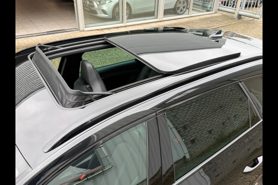 CUPRA Leon Sportstourer 1.4 e-Hybrid 245 Pk Business | Panoramadak | Navigatie | Camera | Clima | Sportstoelen | Keyless | 19".
