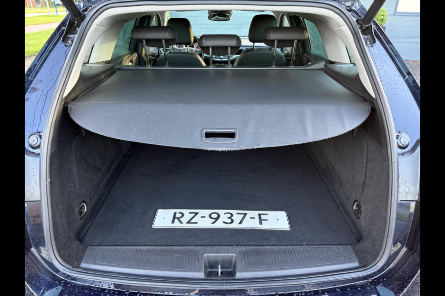 Opel Astra Sports Tourer 1.4 Innovation ✓Trekhaak✓Camera✓Carplay✓Navi✓Recent beurt gehad✓150pk✓Keyless✓Halfleder✓6 Bak✓Rijstrooksensor✓Dodehoeksensor✓Pdc V+A✓Lm velgen✓Clima✓Cruise✓N.A.P✓Apk tot 09-2027