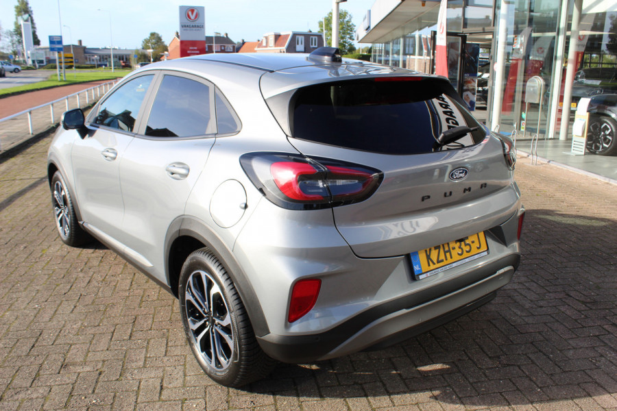 Ford Puma 1.0-125pk EcoBoost Mild-Hybrid Titanium. Z.g.a.n., slechts 3.700km ! Fabrieksgarantie t/m 15-04-2029 ! Autm. airco, navigatie, bluetooth telefoonvoor., winterpakket, rij assistent pakket, metallic lak, etc.
