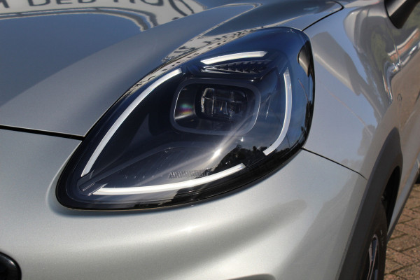 Ford Puma 1.0-125pk EcoBoost Mild-Hybrid Titanium. Z.g.a.n., slechts 3.700km ! Fabrieksgarantie t/m 15-04-2029 ! Autm. airco, navigatie, bluetooth telefoonvoor., winterpakket, rij assistent pakket, metallic lak, etc.