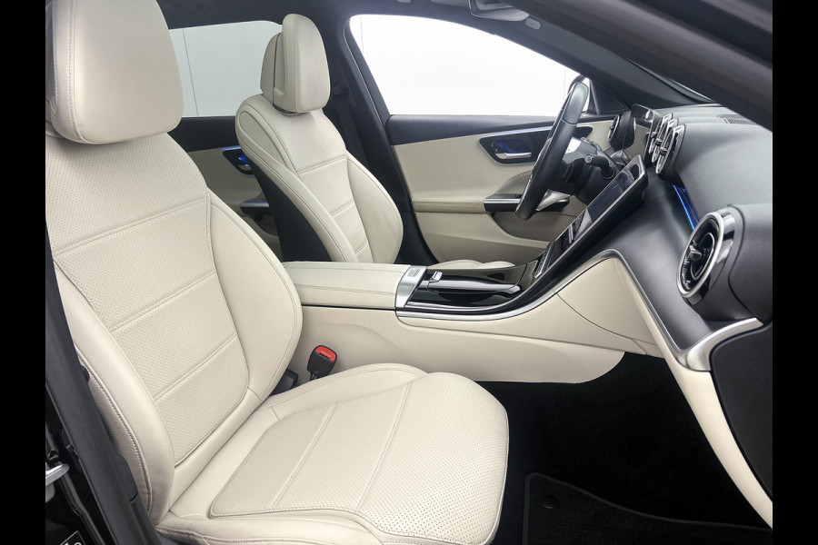 Mercedes-Benz C-Klasse Estate 300 e Luxury Line |  Elektrische voorstoelen| Stoelverwarming voor | 360 Camera | Sfeerverlichting | Lederlook bekleding | Navigatie | Smartphone intergratie | Trekhaak | Inclusief 24 maanden Mercedes-Benz Certified garantie voor Europa.