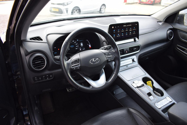 Hyundai Kona EV Premium Sky 64 kWh | SOH: 94,3% | Warmtepomp | Schuifdak | Leer | HUD | Stuur- en Stoelverwarming