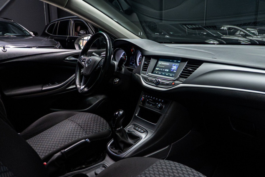 Opel Astra Sports Tourer 1.2T Navi Stoel- & stuurverw. Airco Carplay PDC Cruise BTW auto