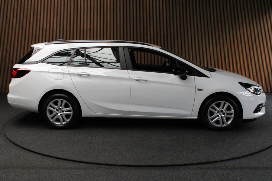 Opel Astra Sports Tourer 1.2 T Navi Airco Cruise PDC BTWauto Sportstoelen Carplay 1e eigenaar