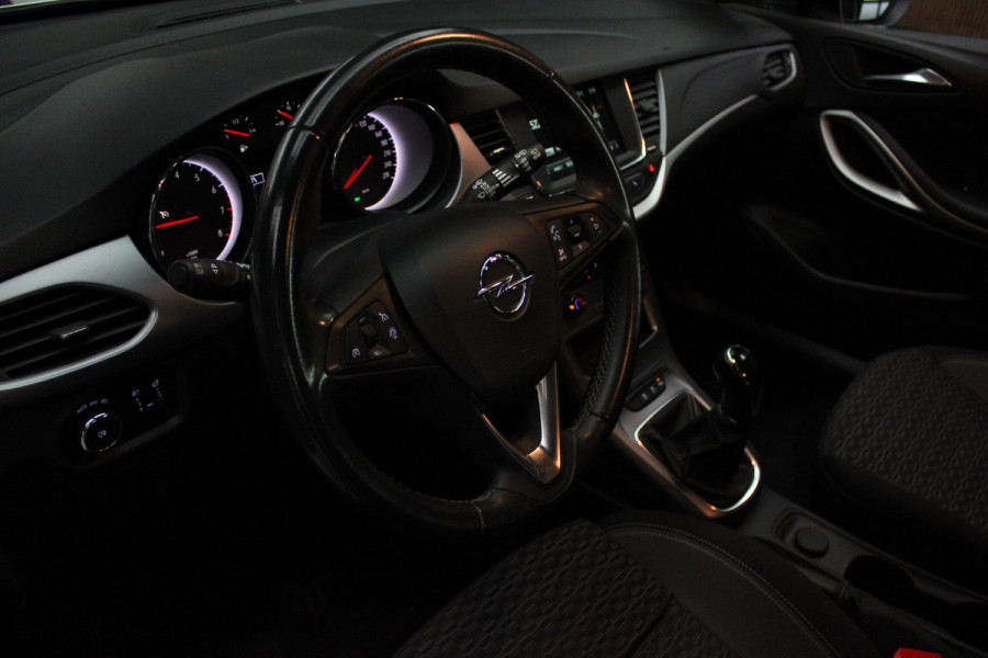 Opel Astra Sports Tourer 1.2 T Navi Airco Cruise PDC BTWauto Sportstoelen Carplay 1e eigenaar
