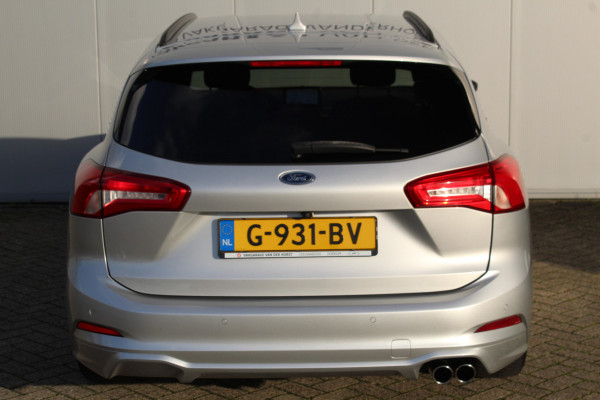 Ford FOCUS Wagon 1.0-125pk EcoBoost ST-Line AUTOMAAT ! Fijne, ruime en erg goed onderhouden wagen ! Autm. airco dual, cruise cntrl, pdc v+a, metallic lak, navigatie, camera, bluetooth tel. voorb., LM wielen, keyless, stoel-, stuur- en voorraamverw., etc.