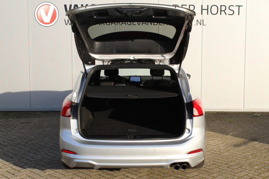 Ford FOCUS Wagon 1.0-125pk EcoBoost ST-Line AUTOMAAT ! Fijne, ruime en erg goed onderhouden wagen ! Autm. airco dual, cruise cntrl, pdc v+a, metallic lak, navigatie, camera, bluetooth tel. voorb., LM wielen, keyless, stoel-, stuur- en voorraamverw., etc.
