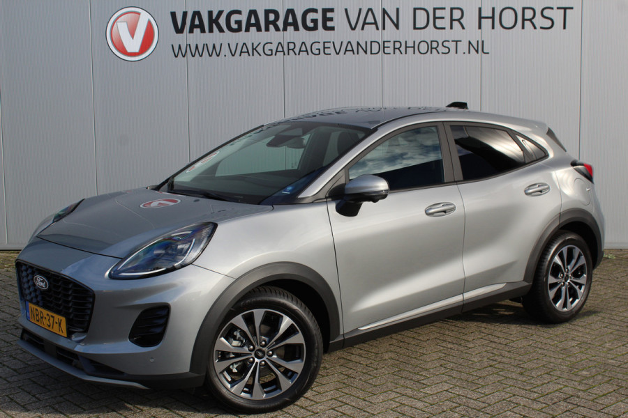 Ford Puma 1.0-125pk EcoBoost Mild-Hybrid Titanium. Z.g.a.n., slechts 3.000km ! Fabrieksgarantie t/m 19-02-2030 ! Autm. airco, navigatie, bluetooth telefoonvoor., all season banden, stoel-, stuur- en voorraamverw., rij assistent pakket, metallic lak, etc.