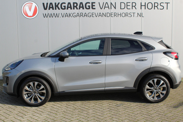 Ford Puma 1.0-125pk EcoBoost Mild-Hybrid Titanium. Z.g.a.n., slechts 3.000km ! Fabrieksgarantie t/m 19-02-2030 ! Autm. airco, navigatie, bluetooth telefoonvoor., all season banden, stoel-, stuur- en voorraamverw., rij assistent pakket, metallic lak, etc.