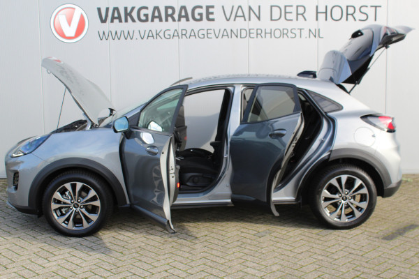 Ford Puma 1.0-125pk EcoBoost Mild-Hybrid Titanium. Z.g.a.n., slechts 3.000km ! Fabrieksgarantie t/m 19-02-2030 ! Autm. airco, navigatie, bluetooth telefoonvoor., all season banden, stoel-, stuur- en voorraamverw., rij assistent pakket, metallic lak, etc.