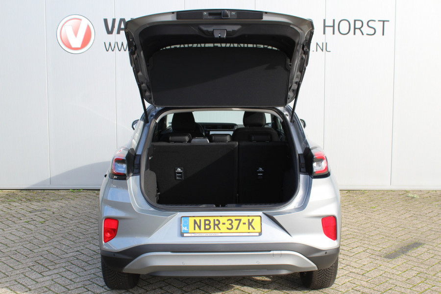 Ford Puma 1.0-125pk EcoBoost Mild-Hybrid Titanium. Z.g.a.n., slechts 3.000km ! Fabrieksgarantie t/m 19-02-2030 ! Autm. airco, navigatie, bluetooth telefoonvoor., all season banden, stoel-, stuur- en voorraamverw., rij assistent pakket, metallic lak, etc.