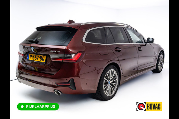 BMW 3 Serie Touring 320e Business Edition Plus | Camera | PDC V+A | Elec. achterklep | Cruise | Navigatie pro | Afn.Trekhaak Apple carplay/Android auto, Lederen bekleding, 18"LMV
