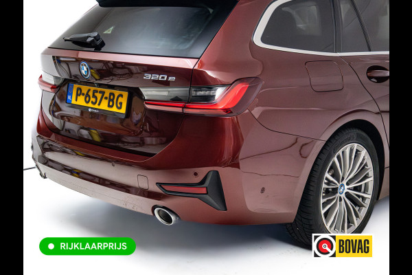 BMW 3 Serie Touring 320e Business Edition Plus | Camera | PDC V+A | Elec. achterklep | Cruise | Navigatie pro | Afn.Trekhaak Apple carplay/Android auto, Lederen bekleding, 18"LMV
