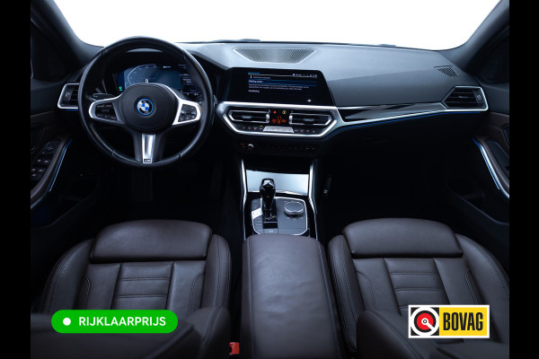 BMW 3 Serie Touring 320e Business Edition Plus | Camera | PDC V+A | Elec. achterklep | Cruise | Navigatie pro | Afn.Trekhaak Apple carplay/Android auto, Lederen bekleding, 18"LMV