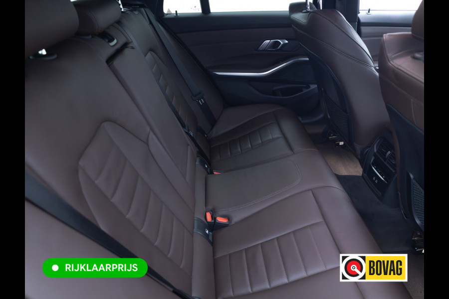 BMW 3 Serie Touring 320e Business Edition Plus | Camera | PDC V+A | Elec. achterklep | Cruise | Navigatie pro | Afn.Trekhaak Apple carplay/Android auto, Lederen bekleding, 18"LMV