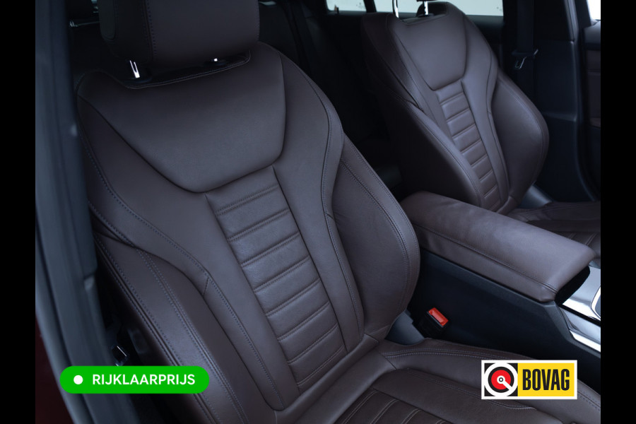 BMW 3 Serie Touring 320e Business Edition Plus | Camera | PDC V+A | Elec. achterklep | Cruise | Navigatie pro | Afn.Trekhaak Apple carplay/Android auto, Lederen bekleding, 18"LMV