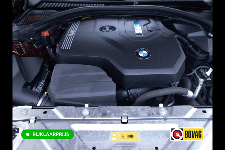 BMW 3 Serie Touring 320e Business Edition Plus | Camera | PDC V+A | Elec. achterklep | Cruise | Navigatie pro | Afn.Trekhaak Apple carplay/Android auto, Lederen bekleding, 18"LMV