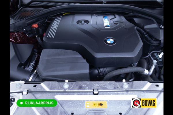 BMW 3 Serie Touring 320e Business Edition Plus | Camera | PDC V+A | Elec. achterklep | Cruise | Navigatie pro | Afn.Trekhaak Apple carplay/Android auto, Lederen bekleding, 18"LMV